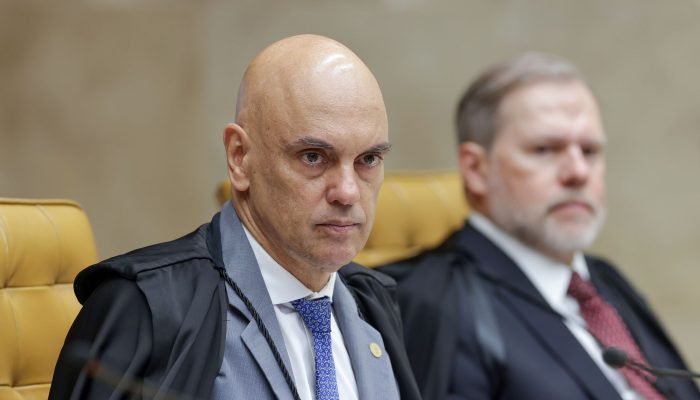 O ministro do STF Alexandre de Moraes; ao fundo, Dias Toffoli. (Foto: Rosinei Coutinho/STF)